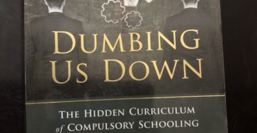 Dumbing us Down Book Cover